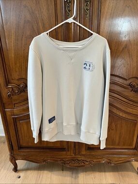 Disney Cream Sweatshirt with Blue Park Skyline Graphic